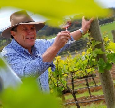 Photography of Charles Wooley enjoying Australia's finest red wine